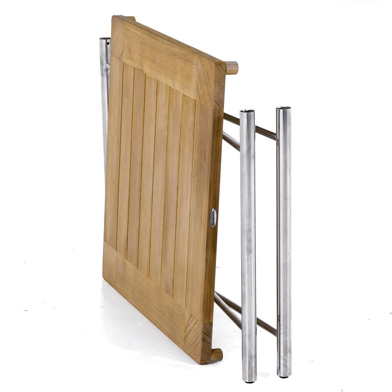 alt="25815 Odyssey teak and stainless steel dining table folded flat angled side view on white background"
