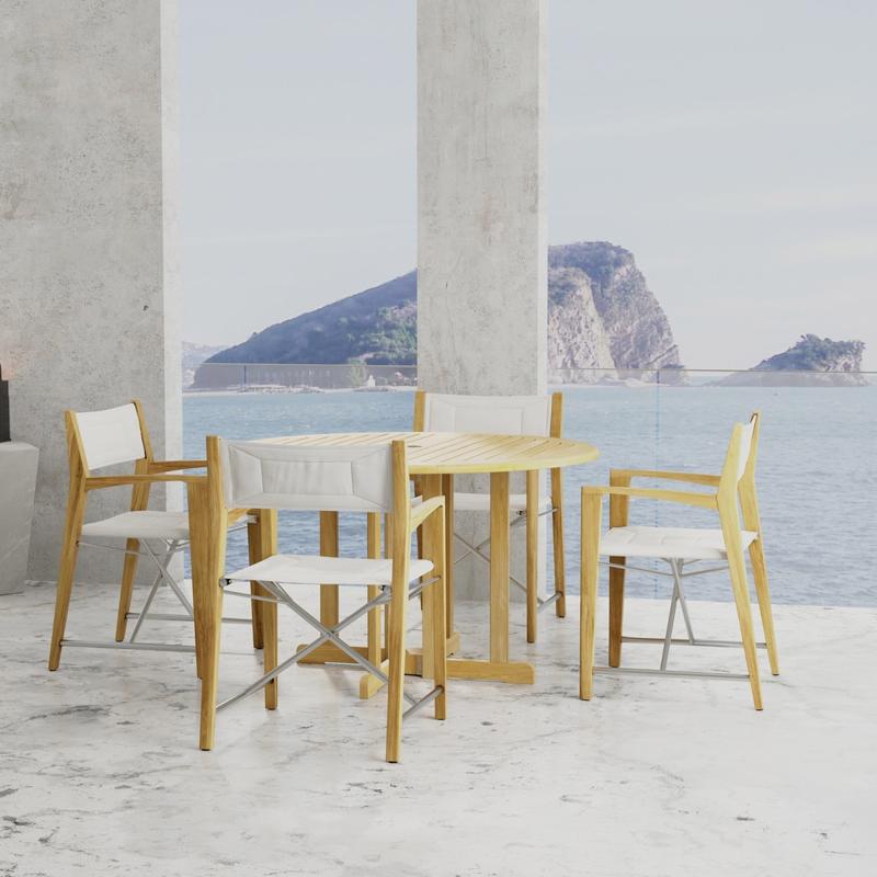 alt="70473 Odyssey Barbuda 5 piece Folding Dining Set of 4 folding director chairs and 48 inch round teak table on marble patio with small islands and blue sky and ocean in the background"