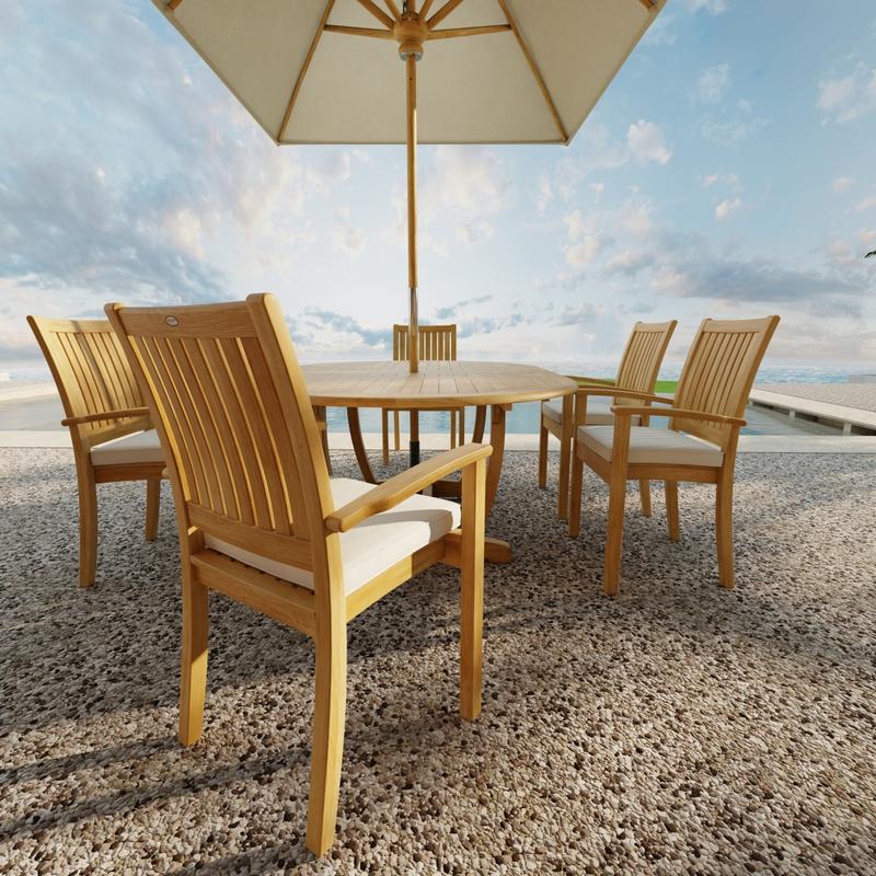 alt=" 70214 Martinique Sussex Teak 7 pc Dining Set with optional seat cushions and umbrella in side view next to pool with blue sky in background"