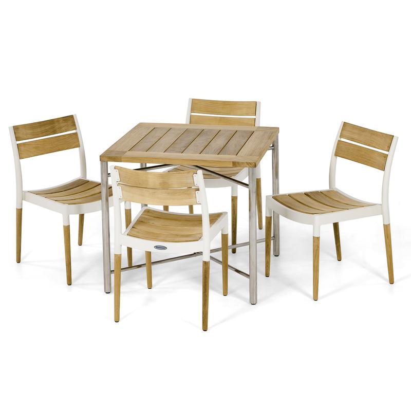 alt="70599 Odyssey Bloom Dining Set of Odyssey teak and stainless steel square dining table and 4 teak and powder coated side chairs on white background"