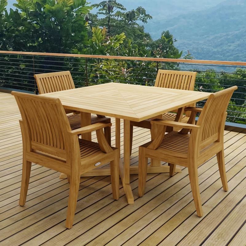 alt="70904 Laguna Pyramid 5 pc Square Dining Set of Pyramid Square Table and 4 Laguna Armchairs angled corner view on wood deck with trees and blue sky in the background"