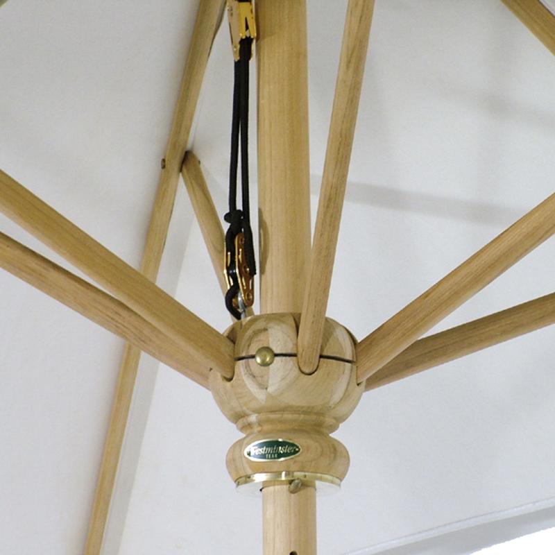 alt=" 17640 grand ten foot rectangular teak umbrella with white canvas canopy showing inside construction showing arms shaft and black rope atop the hub"