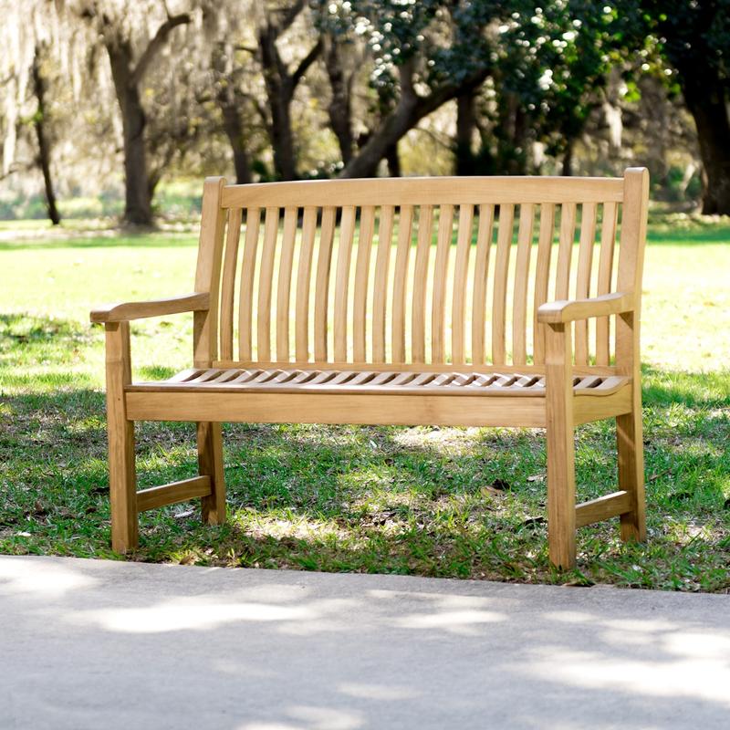 alt="13218 Veranda Teak 4 foot Bench on grass lawn with walkway in front"