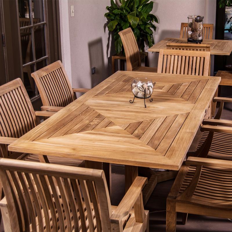 alt="70422 7 piece Pyramid Teak Dining Set on teracotta patio with french doors on left"