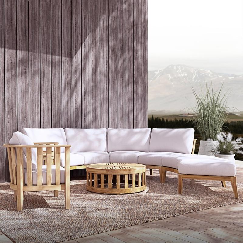 alt="70929 Kafelonia 6 piece Sofa Sectional Set angled front view on outdoor patio in front of building next to 2 potted plants with mountains in background"