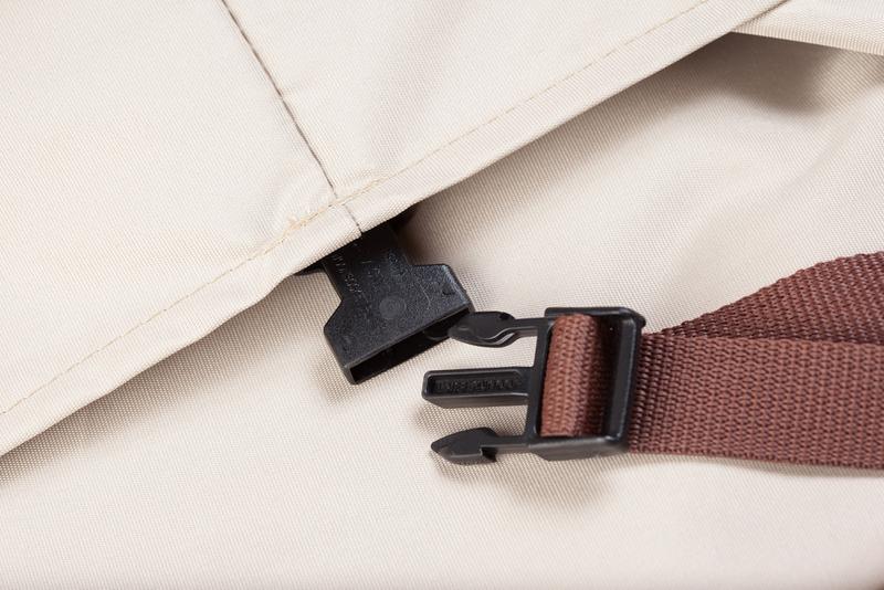 alt="60818 Maya 3 piece Sofa Cover showing closeup view of securing strap clasp buckle on cover"