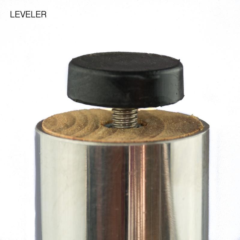 alt="25815 Odyssey teak and stainless steel dining table bottom leg showing closeup view of leveler on white background"