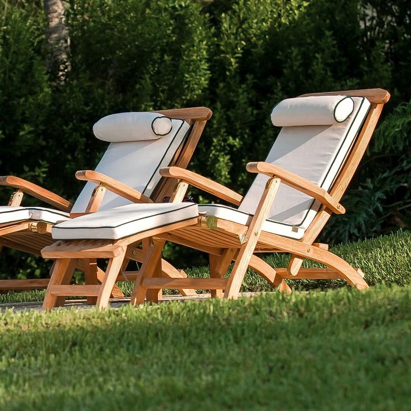 alt="16411s Barbuda Captain Steamer with optional cushions two side by side on grass lawn and trees in background"